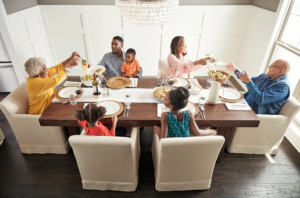 Happy family enjoying breakfast | Roberts Carpet